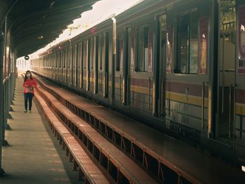 Blurred motion of train at railroad station