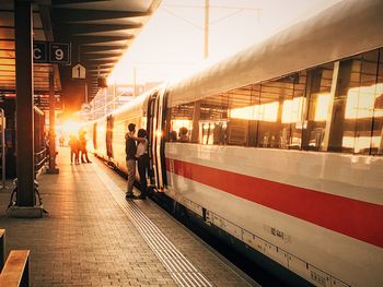 Blurred motion of people at railroad station in city