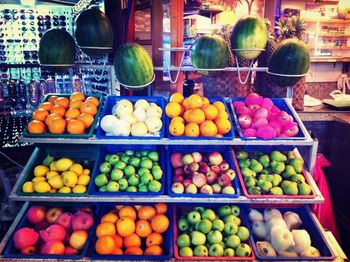 Variety of fruits for sale at market stall