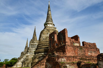 Low angle view of old ancient against sky