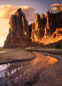 View of rock formations against sky during sunset