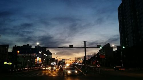 City street against cloudy sky