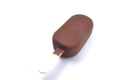 Close-up of ice cream over white background