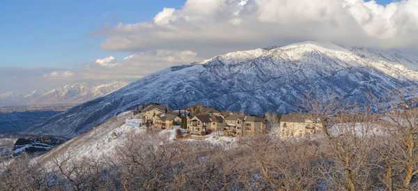 Scenic view of snowcapped mountains against sky