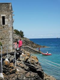 Scenic view of sea against clear blue sky