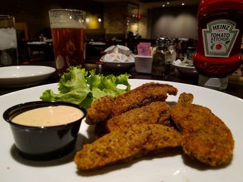 Close-up of food served on table