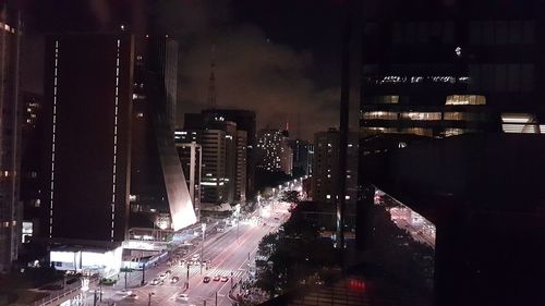 High angle view of traffic on city street at night