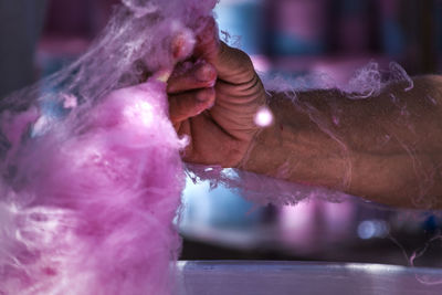 Close-up of man preparing food