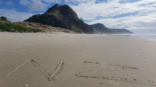 Scenic view of beach against sky