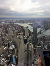 Aerial view of cityscape against sky