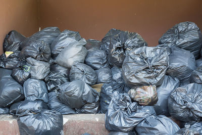 Garbage bags against wall