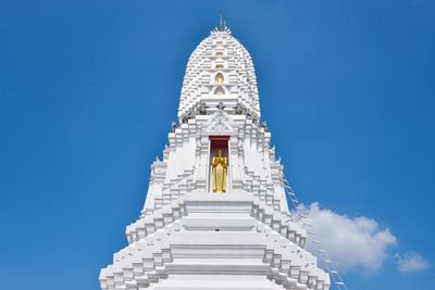 Low angle view of building against blue sky