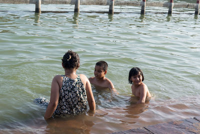 Kids having fun in river