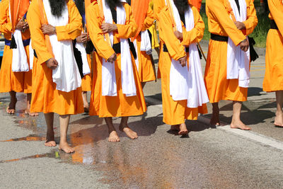 People walking on street in city