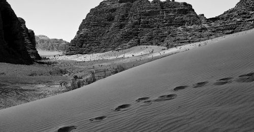 Scenic view of desert against clear sky