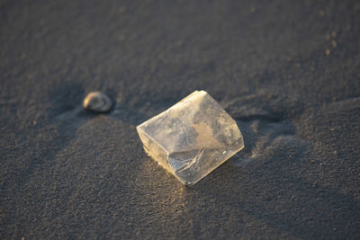 High angle view of plastic on beach