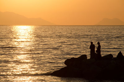 Scenic view of sea at sunset