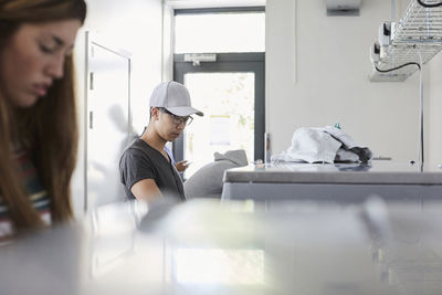 Portrait of young woman working