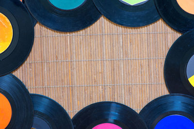 Directly above shot of records on mat