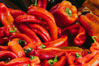 Full frame shot of red chili peppers for sale at market
