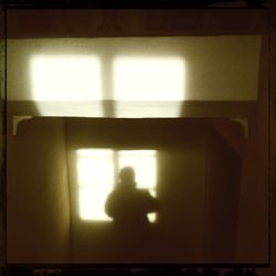 Close-up of woman standing on tiled floor