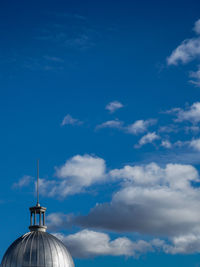 Low angle view of built structure against blue sky