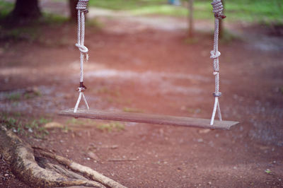 Close-up of swing at playground