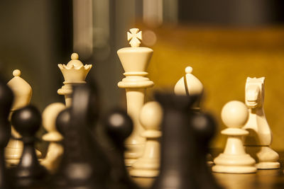 Close-up of chess pieces on board