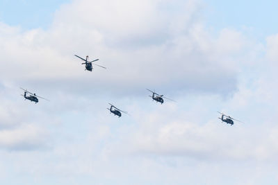 Low angle view of airshow in sky