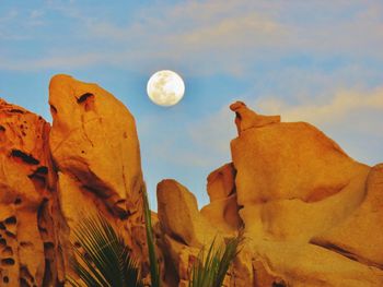 Low angle view of moon against sky