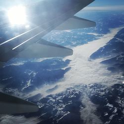 Aerial view of landscape against sky during winter