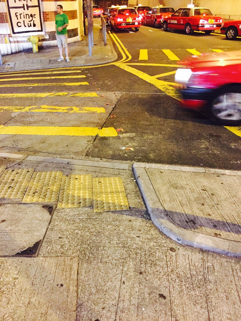 transportation, street, car, land vehicle, mode of transport, road, road marking, incidental people, high angle view, city street, asphalt, city, outdoors, multi colored, city life, sidewalk, day, parking lot, zebra crossing, travel