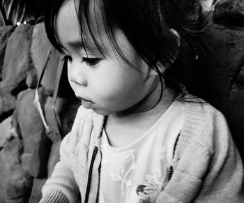 Close-up portrait of girl looking away