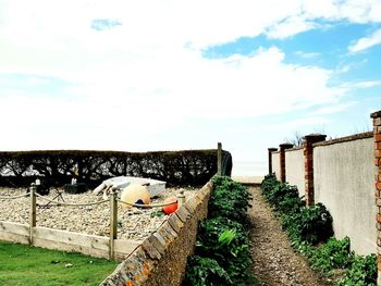 View of footpath against sky