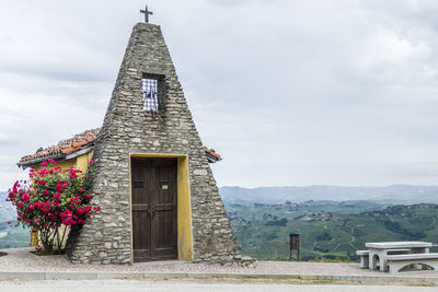 Landscape of the hills of the piedmont with the church of saint francesco in la morra