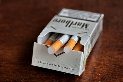 High angle view of cigarette on table