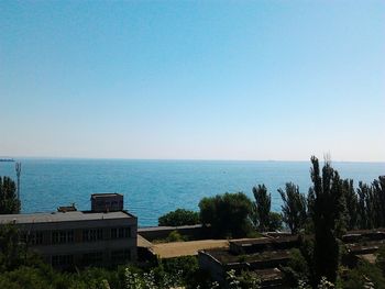 Scenic view of sea against blue sky