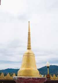 Stupas of building against sky