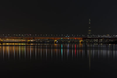 Bridge by han river in city at night