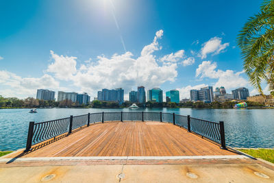 Panoramic view of sea and buildings against sky