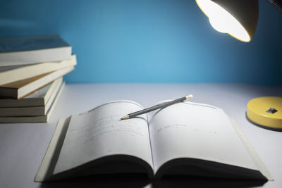 Close-up of open book on table