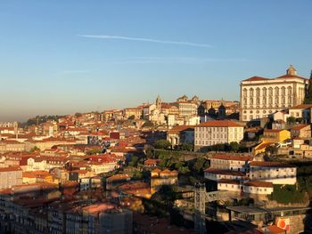 High angle shot of townscape against blue sky