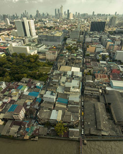 High angle view of buildings and street in city