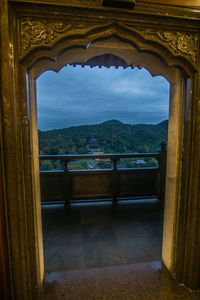 View of building seen through window