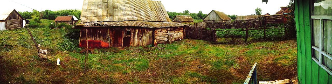 building exterior, architecture, built structure, house, grass, abandoned, plant, old, residential structure, damaged, obsolete, day, sky, field, residential building, outdoors, no people, run-down, growth, sunlight