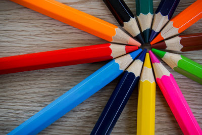 Directly above shot of multi colored pencils on table