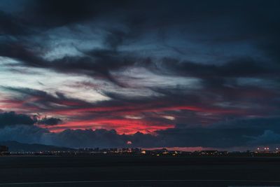 Scenic view of dramatic sky during sunset