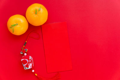 High angle view of orange fruits against wall