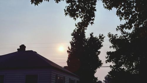 Low angle view of building at sunset