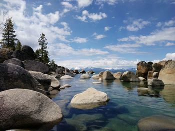 Rocks on shore against sky